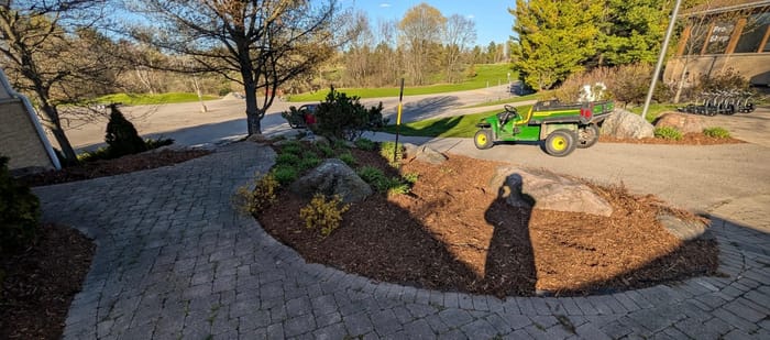 After: Entrance bed mulch installation