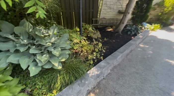 After: retaining wall and bed edging install