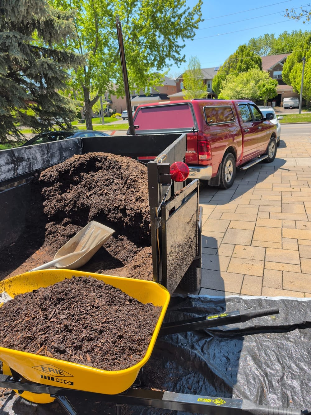 Maple Property Maintenance truck loaded with mulch